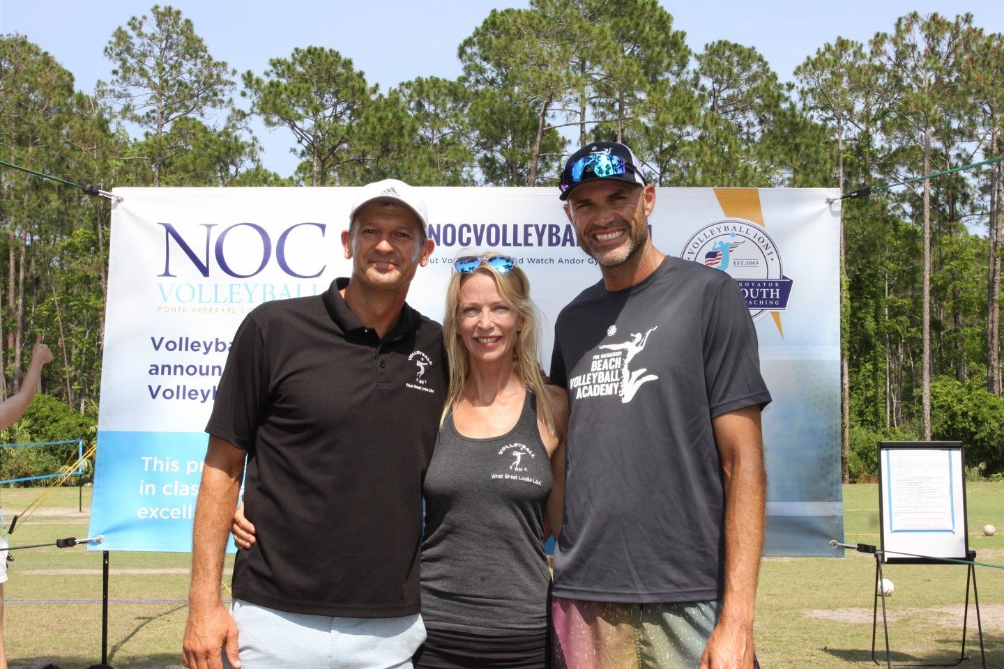 Olympic gold medalist Phil Dalhausser was the guest during a recent youth volleyball class in Nocatee Community Park. Pictured from left are Volleyball1on1 co-founders Andor Gyulai and Vanessa Summers-Gyulai and Dalhausser.